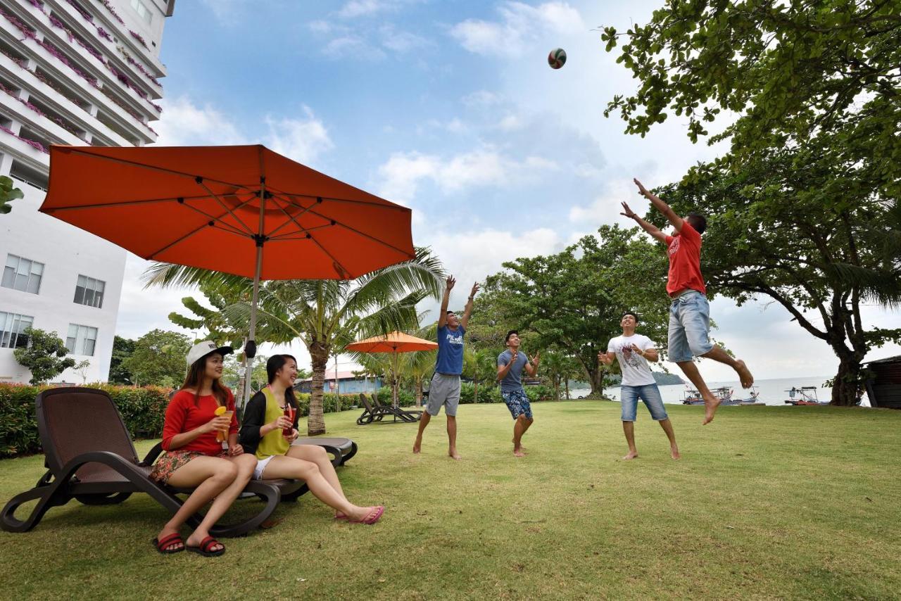Lexis Suites Penang Bayan Lepas Exterior photo The lawn at the beach resort