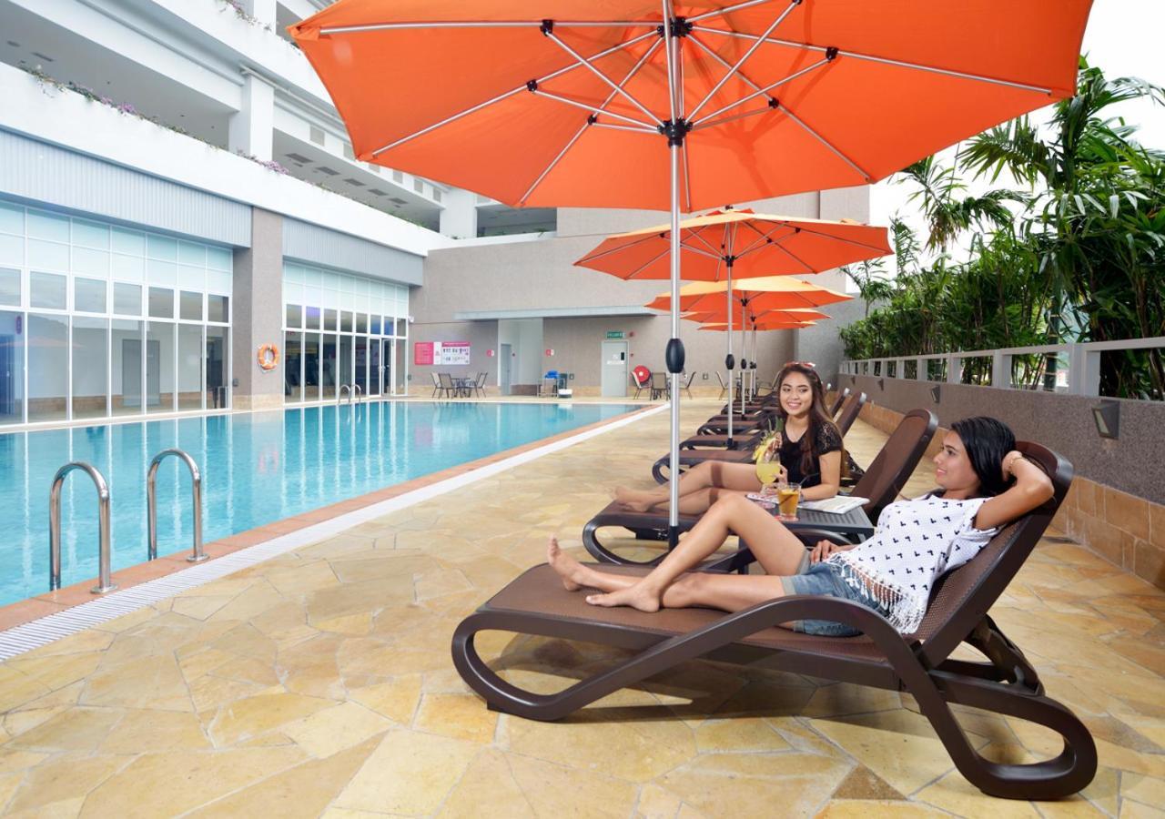 Lexis Suites Penang Bayan Lepas Exterior photo Poolside at the hotel