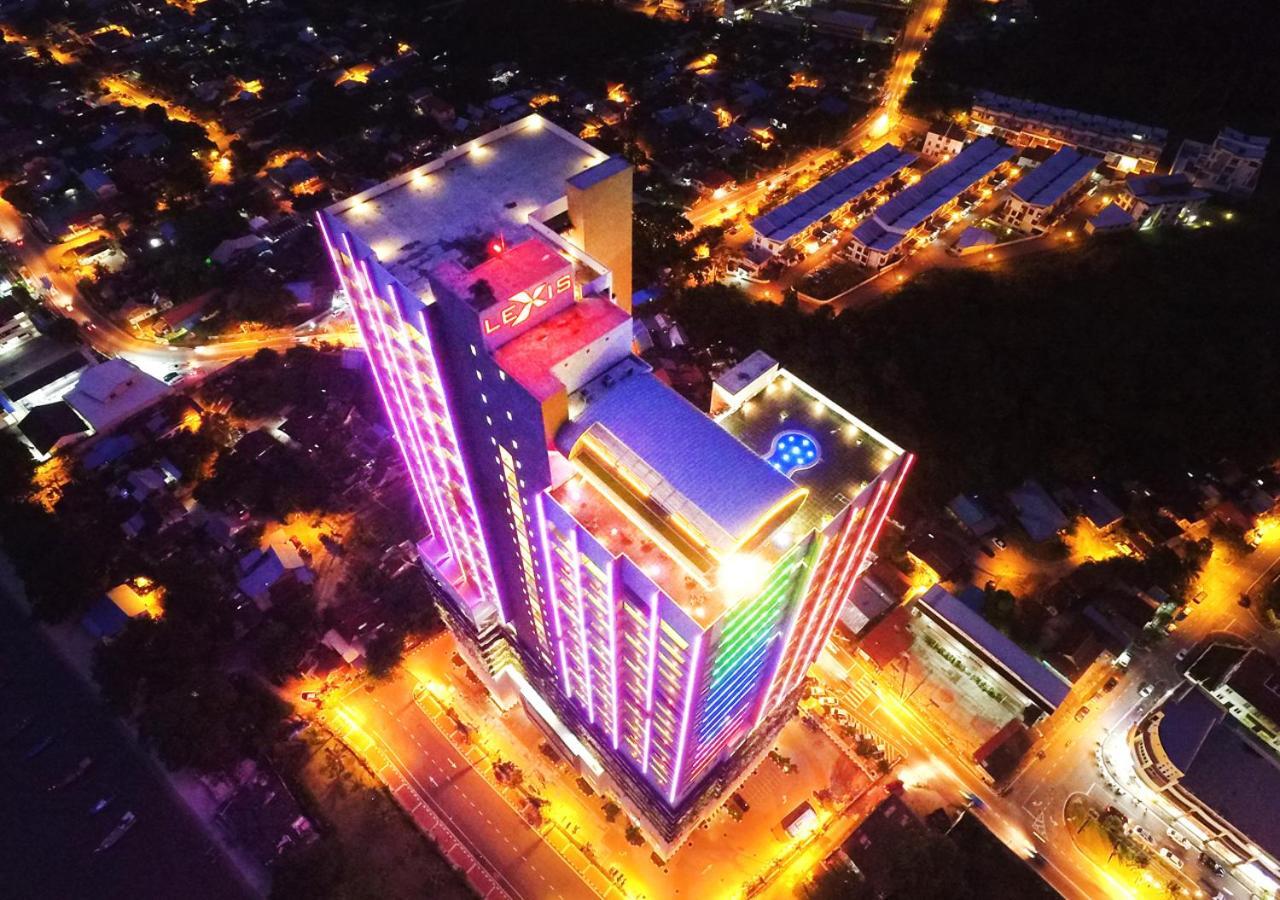 Lexis Suites Penang Bayan Lepas Exterior photo Aerial view of the hotel at night